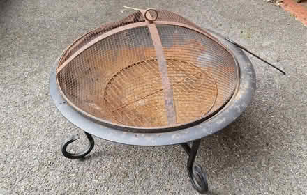 Photo of free Metal Fire pit with cover (Arborfield Garrison RG2) #1