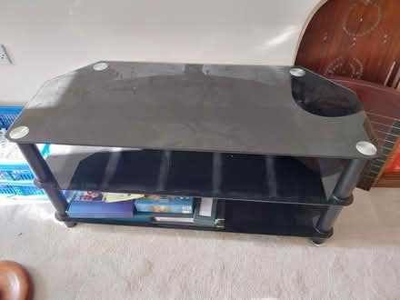 Photo of free Black glass tv unit (Southborough TN4) #1