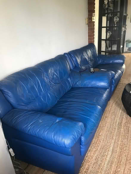 Photo of free 2 two seater blue leather sofa (Silverhill TN34) #1