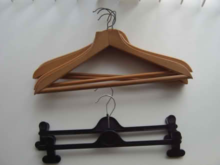 Photo of free 4 sturdy coat/suit/ trouser hangers also 2 skirt hangers (Durrington BN13) #1