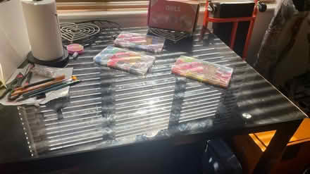 Photo of free Black glass dining table (Leicester) #1