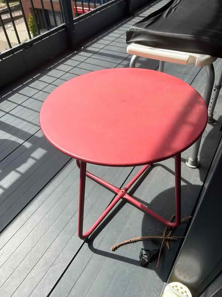 Photo of free Small red metal table (Butetown CF10) #1