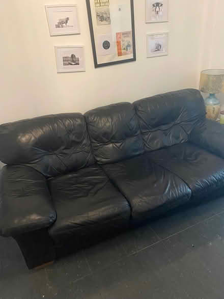 Photo of free Black leather three seater sofa (Wyken,Coventry) #1