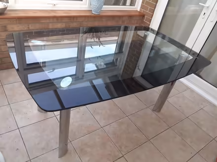 Photo of free Large Glass Top Table (Sherborne) #1