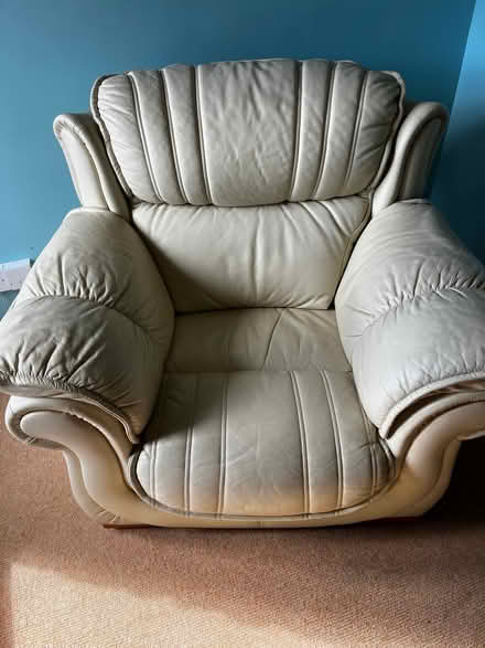 Photo of free Large leather effect cream coloured armchair (Lupton LA6) #1