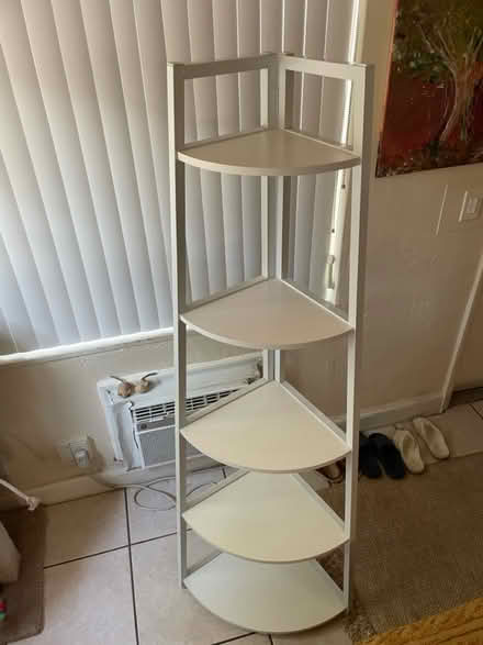 Photo of free White tiered shelf 70” tall (Hallandale Beach Blvd and US1) #2