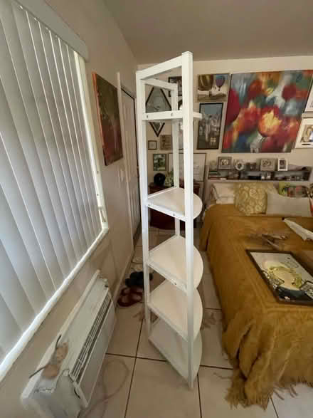 Photo of free White tiered shelf 70” tall (Hallandale Beach Blvd and US1) #3