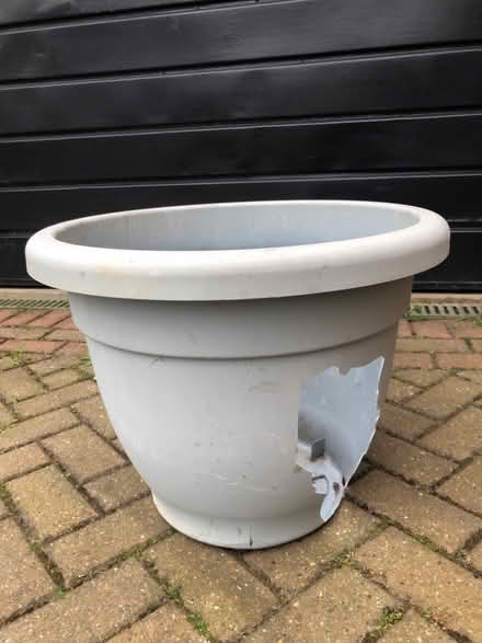 Photo of free Large grey plastic plant pot 47cm diameter (damaged) (Whitehill SG4) #1