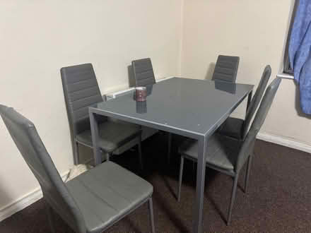 Photo of free Glass top dinning table with six chairs (Ware SG12) #2