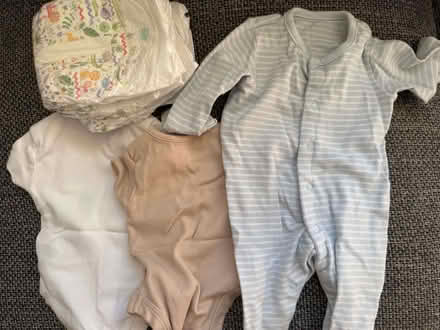 Photo of free A few things for a newborn. Unworn clothes, unused nappies (Bracknell Forest RG12) #1