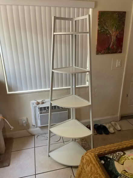 Photo of free White tiered shelf 70” tall (Hallandale Beach Blvd and US1) #1