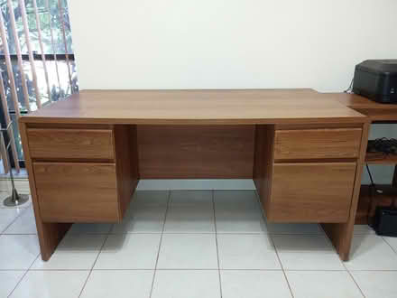 Photo of free Large wooden desk (Sunrise- near City Hall) #1