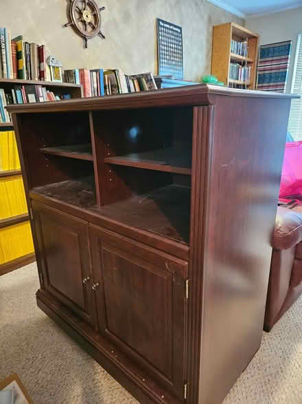 Photo of free Wood entertainment cabinet (Beavercreek) #3