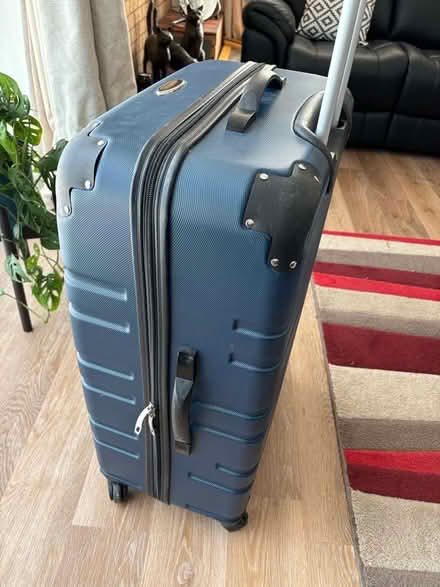Photo of free Large hard shell suitcase. (Spital CH63) #2