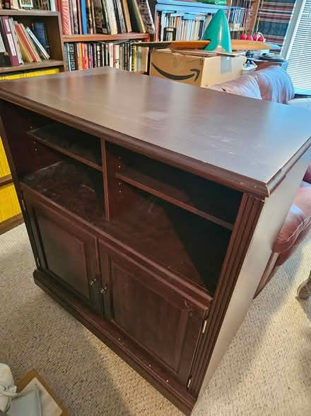 Photo of free Wood entertainment cabinet (Beavercreek) #2