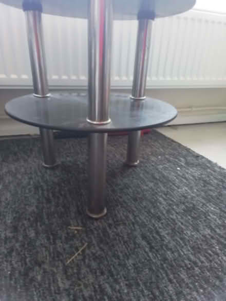 Photo of free Tempered dark glass 2 tier table (Coggeshall CO6) #1
