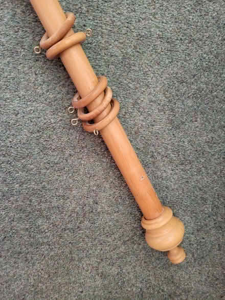 Photo of free Wooden curtain pole 116cm, plus finials and rings (Corston) #2