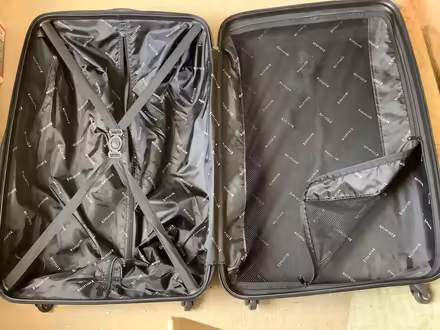 Photo of free Large suitcase on castors (Loughborough LE11) #2