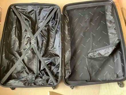 Photo of free Large suitcase on castors (Loughborough LE11) #2