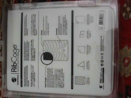 Photo of free White IPAD Cover with Rib Cage Effect (Coppull PR7) #3