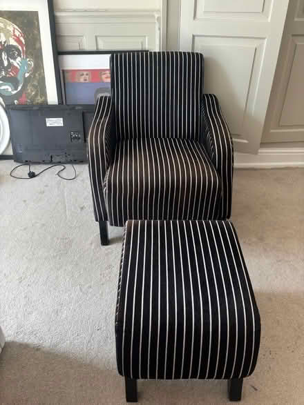 Photo of free Black and white stripe upholstered armchair and footstool . (Belle Vue SY3) #1