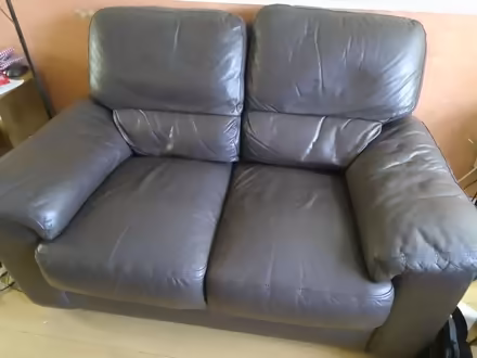 Photo of free Brown leather sofa X2 (Peterborough) #2
