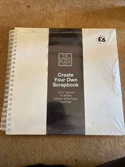 Photo of free Unopened 12” x 12” scrapbook (Highlands Village, N21) #1