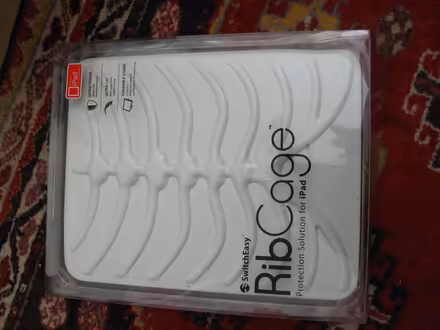 Photo of free White IPAD Cover with Rib Cage Effect (Coppull PR7) #1