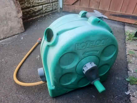 Photo of free Garden hose and wall mounted reel (Ash Green, GU12) #1