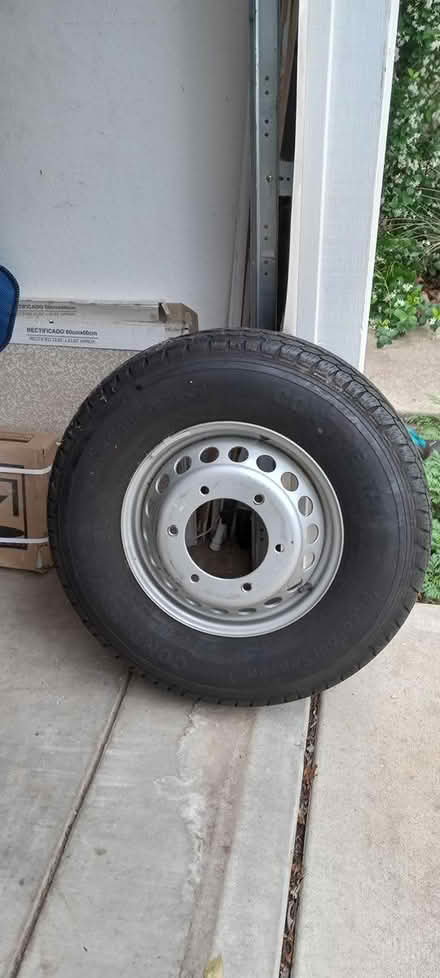 Photo of free Large heavy-duty wheel with tire (East Austin near the airport) #2
