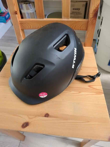 Photo of free Black adult helmet (Newport Pagnell MK16) #1