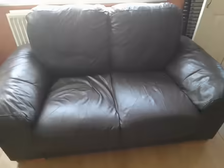 Photo of free Brown leather sofa X2 (Peterborough) #1