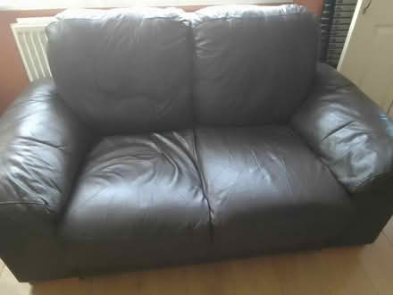 Photo of free Brown leather sofa X2 (Peterborough) #1