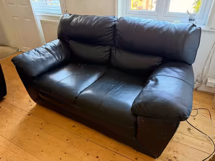 Photo of free Black leather sofa (Crowborough) #2