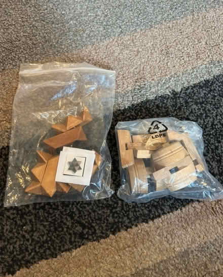 Photo of free 2 wooden brain teaser puzzles (Jennetts park RG12) #1