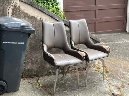 Photo of free 2 worn out faux leather chairs (104 Martens Blvd, San Rafael) #1