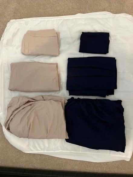 Photo of free 2 Twin XL sheet sets + mattress pad (Vienna community center) #1