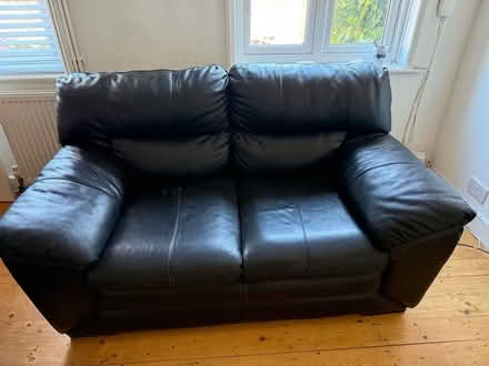 Photo of free Black leather sofa (Crowborough) #1