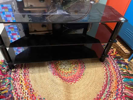 Photo of free Tv Unit. Glass. Three shelves (Letchworth) #1