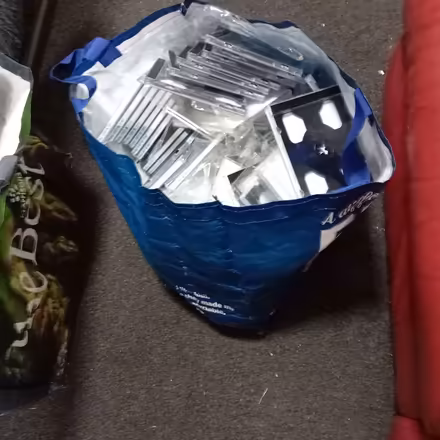 Photo of free Bag full of unused 2 CD hard cases (must be over a hundred) (Denton M34) #1