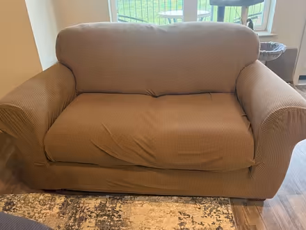 Photo of free Loveseat (Sheridan and 96th Ave) #1