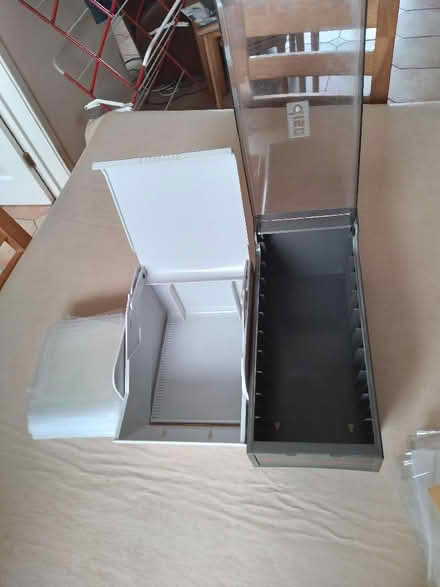 Photo of free CD/DVD case boxes (2) and open CD Racks (4) (Eastfield NE23) #2