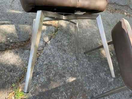Photo of free 2 worn out faux leather chairs TLC (104 Martens Blvd, San Rafael) #3