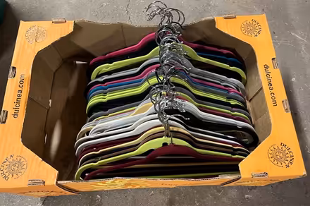 Photo of free Flocked skinny hangers (East Weymouth) #1