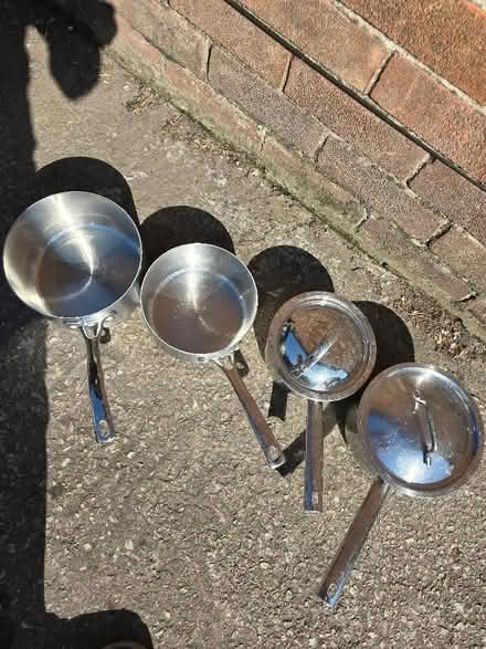 Photo of free Four heavy duty stainless steel pans (Rufford L40) #1