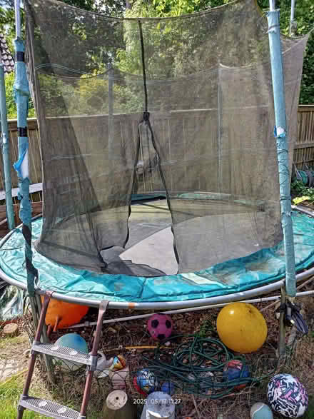 Photo of free 10 ft trampoline - safety net, ladder etc (Fords Farm RG31) #2