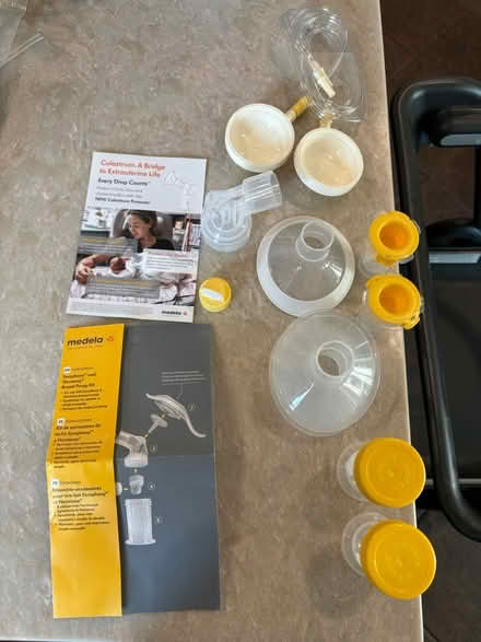 Photo of free Medela pump parts and containers (Evanston (Green Bay & Emerson)) #1