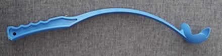 Photo of free Dog ball thrower - a few chew marks on top of the handle. (Cogenhoe) #1