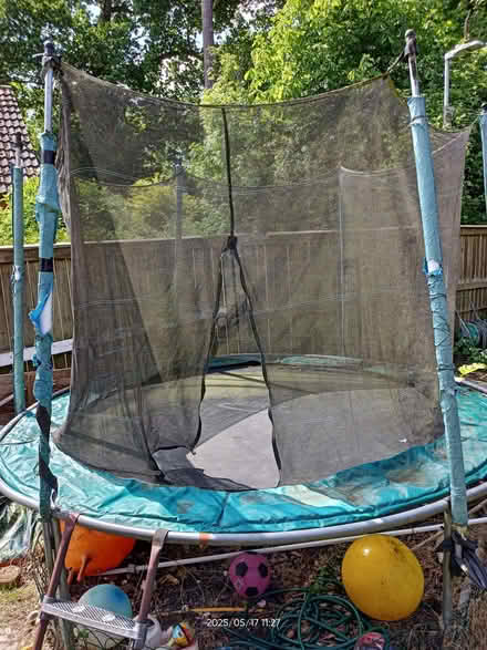 Photo of free 10 ft trampoline - safety net, ladder etc (Fords Farm RG31) #1