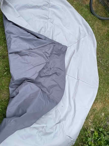 Photo of free Parasol cover 8 strut faded (Oxford) #2